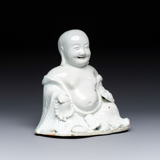 A Chinese white-glazed Milefo Buddha, 19th C.