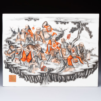 A Chinese grisaille and iron-red decorated '18 Luohan' plaque, Qianlong mark, 20th C.