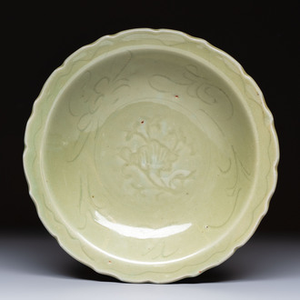 A Chinese Longquan celadon plate with incised floral design, Ming