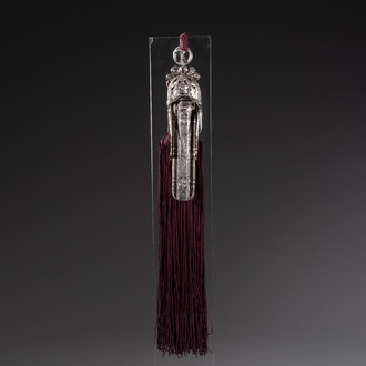 A fine Chinese silver pendant with inscriptions on a plexiglas stand, 19th C.