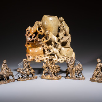 Five Chinese bronze 'Immortal' groups and a carved soapstone 'Monkeys' sculpture, 20th C.