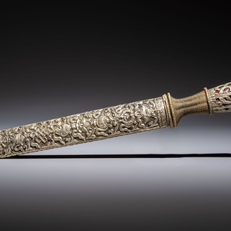 A Tibetan white metal 'Buddhist Symbols' dagger and scabbard, first half 20th C.