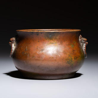 A Chinese bronze censer with lion-head handles and relief dragon design, Lu Gu Zhai 侶古齋 mark, 18/19th C.