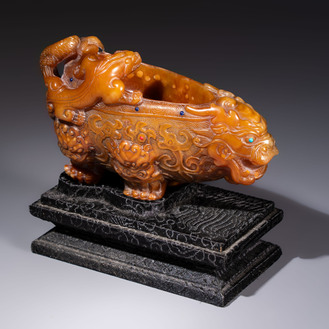 A Chinese precious-stone-inlaid carved soapstone wine vessel on stand, Gong 觥, Republic