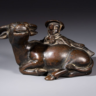 A Chinese bronze 'Boy and Buffalo' paperweight, Ming