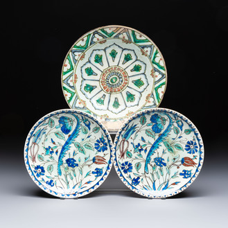 A polychrome Iznik pottery plate and two Kutahya plates, Turkey, 16/19th C.