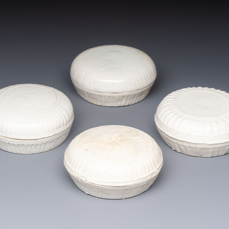 Four Chinese white-glazed boxes and covers with incised floral design from the Jepara shipwreck, Dehua or Anxi kiln, Song