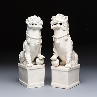 A pair of large Chinese Dehua blanc de Chine buddhist lion joss stick holders, 19th C.