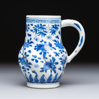 A Chinese blue and white twisted jug with floral design, Kangxi