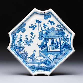 A blue and white Dutch Delft 'Chinoiserie' plaque with figures in garden, 18th C.