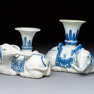 Two Chinese blue and white recumbent elephant-form candlesticks, Jiaqing