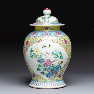 A Chinese famille rose vase and cover with birds among flowering branches, 19th C.