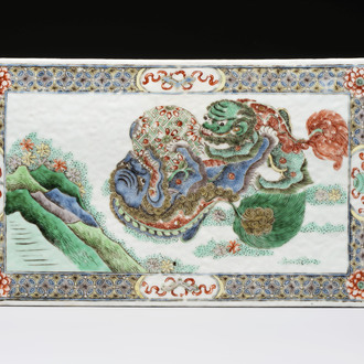 A Chinese famille verte 'Buddhist Lions' plaque, 19th C.