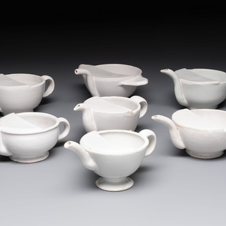 Seven white-glazed Delft or French faience feeding cups or 'Canards de Malade', 19th C.