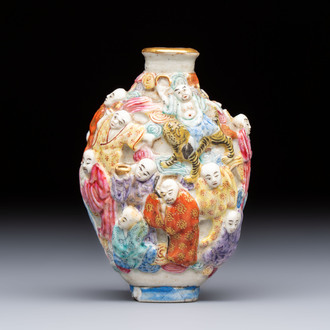 A Chinese famille rose moulded '18 Luohan' snuff bottle, Qianlong mark, 19th C.