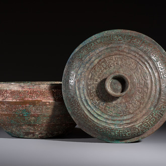 A Chinese archaic bronze serving vessel and cover, Eastern Zhou/Spring and Autumn