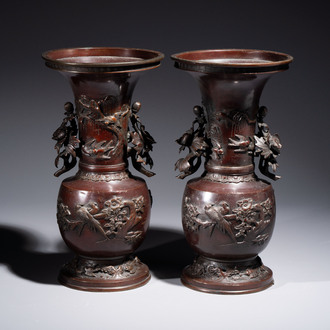 A pair of Japanese bronze vases with relief design of birds among flowering branches, signed Hasegawa Harusada 長谷川晴定, 19th C.
