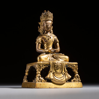 A Sino-Tibetan gilt-bronze figure of Buddha Amitayus, inscribed, Qianlong