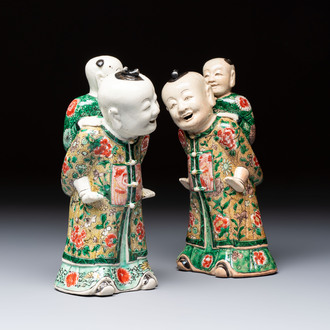 A pair of Chinese verte biscuit 'Piggyback Boys' groups, Kangxi