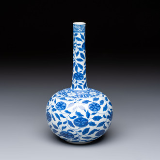 A rare Chinese 'G-marked' blue and white bottle vase with floral design, Kangxi