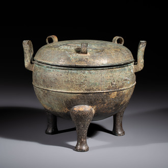 A Chinese archaic bronze tripod food vessel and cover, Ding 鼎, Eastern Zhou