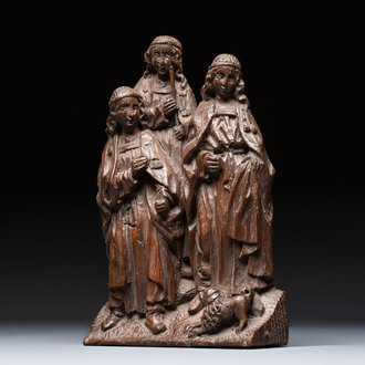 A Flemish carved oak group, 16th C.