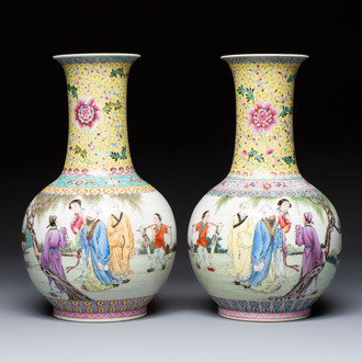 A pair of Chinese famille rose bottle vases, Qianlong mark, 20th C.