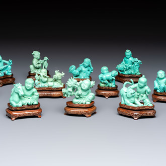 A complete set of 12 Chinese carved turquoise 'Children at Play with the Zodiac Animals' figures on wooden stands, Republic
