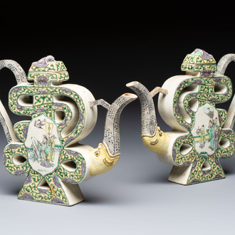 A pair of Chinese verte biscuit 'Shou' wine ewers, 19th C.