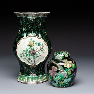 A Chinese verte biscuit black-ground vase and a covered jar, Xuande and Kangxi mark, 19th C.