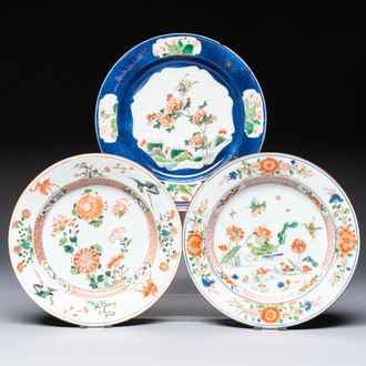 Three Chinese famille verte plates with floral design, one powder-blue-ground, Kangxi
