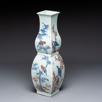 A Chinese blue, white and copper-red 'Birds among Flowering Branches' square gourd vase, 19th C.