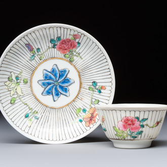 A Chinese famille rose cup and saucer with floral design, Yongzheng