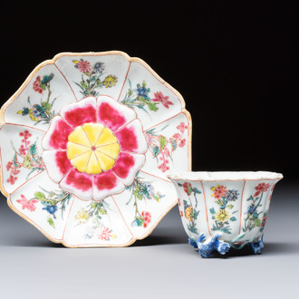A rare Chinese famille rose moulded cup and saucer with floral design, Yongzheng
