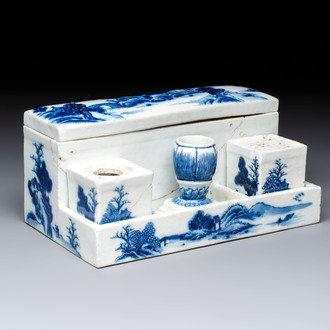 A rare Chinese blue and white 'Mountainous Landscape' writing set with an inkwell, sander and candlestick, Qianlong