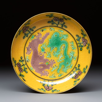 A small Chinese yellow-ground aubergine and green enamelled dragon plate, Qianlong mark, 19/20th C.