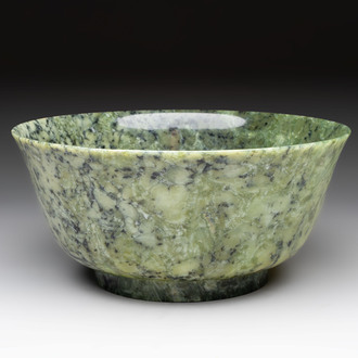 A large Chinese mottled-green serpentine bowl, 20th C.