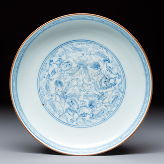 A Chinese blue and white pencil-style 'Buddhist Lions' plate, Chenghua mark, Shunzhi/Kangxi