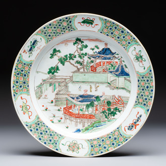 A Chinese famille verte 'Pavilions and Lotus Pond' dish, swastika mark, Kangxi