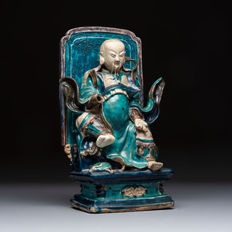 A Chinese fahua-glazed biscuit figure of Zhenwu, Ming