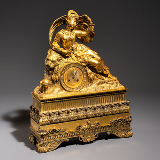 A gilt-bronze 'Oriental Beauty Reclining on a Lion Skin' mantel clock, France, first quarter 19th C.