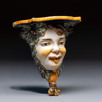 A polychrome Italian maiolica 'Faun Head' wall console, 19th C.