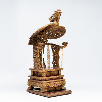 An exceptional Vietnamese gilt-lacquered wood and ivory 'Dragon and Phoenix' throne-shaped altar, 18/19th C.