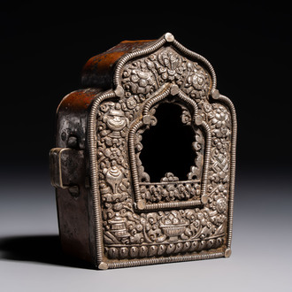 A Tibetan silver and copper Ghau or prayer box, 19th C.