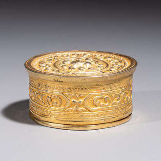 A fine Tibetan gilt-bronze box and cover with repoussé scroll decoration, 18th C.
