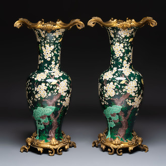 A massive pair of gilt-bronze-mounted famille noire style vases, Samson, Paris, 19th C.
