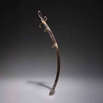 An Ottoman officer's engraved shamshir-type sabre with a gilt-bronze and wooden hilt, Turkey, 19th C.