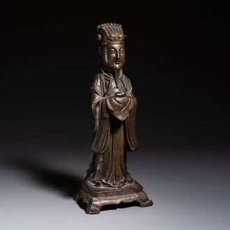 A Chinese bronze figure of an official, Ming