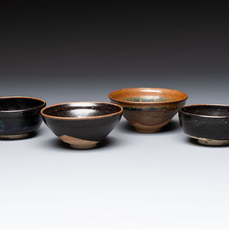 Two Chinese Jian tea bowls and two Dongzhangyao black-glazed tea bowls, Song