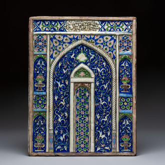A very large inscribed rectangular moulded Qajar 'mihrab' tile inscribed Sultan Abu Saeed Khan, 19th C.